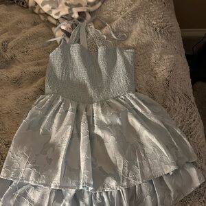 blue open back romper size XL,new worn